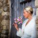 Bride flowers sitting barn door
